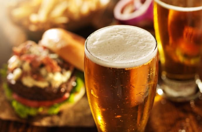 Ice cold beer served with a burger