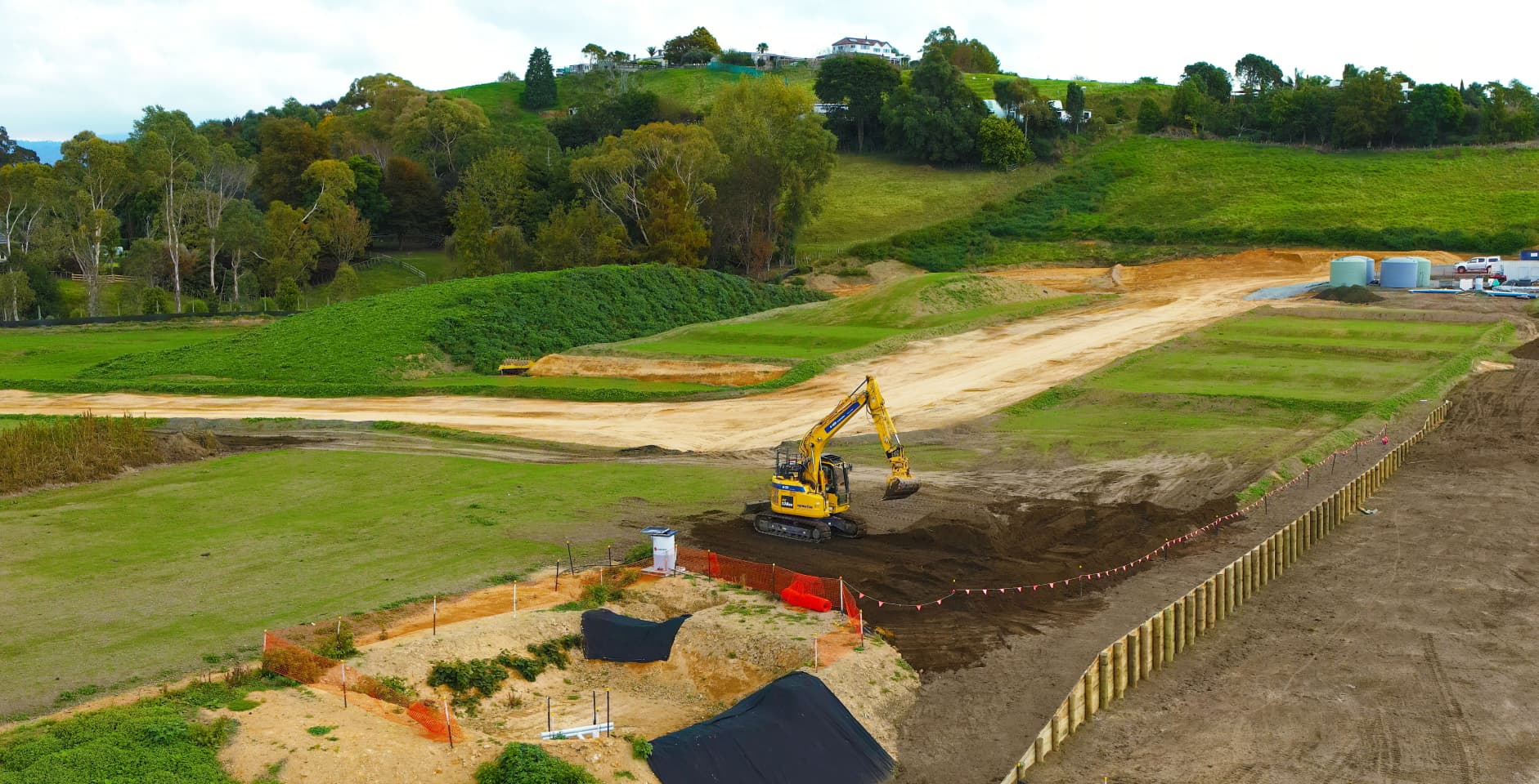 drone shot of a digger on a construction site